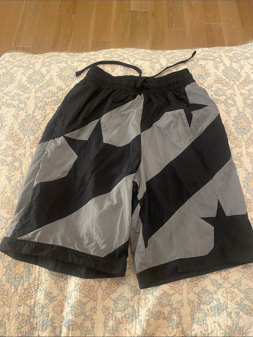Nike swim trunk small 
Black & Gray Star